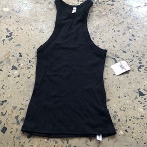 A black free people tank top.